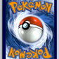 The back of a Pokémon trading card. Poké Ball design on a blue background