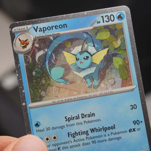 Vaporeon 168 Prismatic Evolutions Cosmos Holo Black Star Promo Card